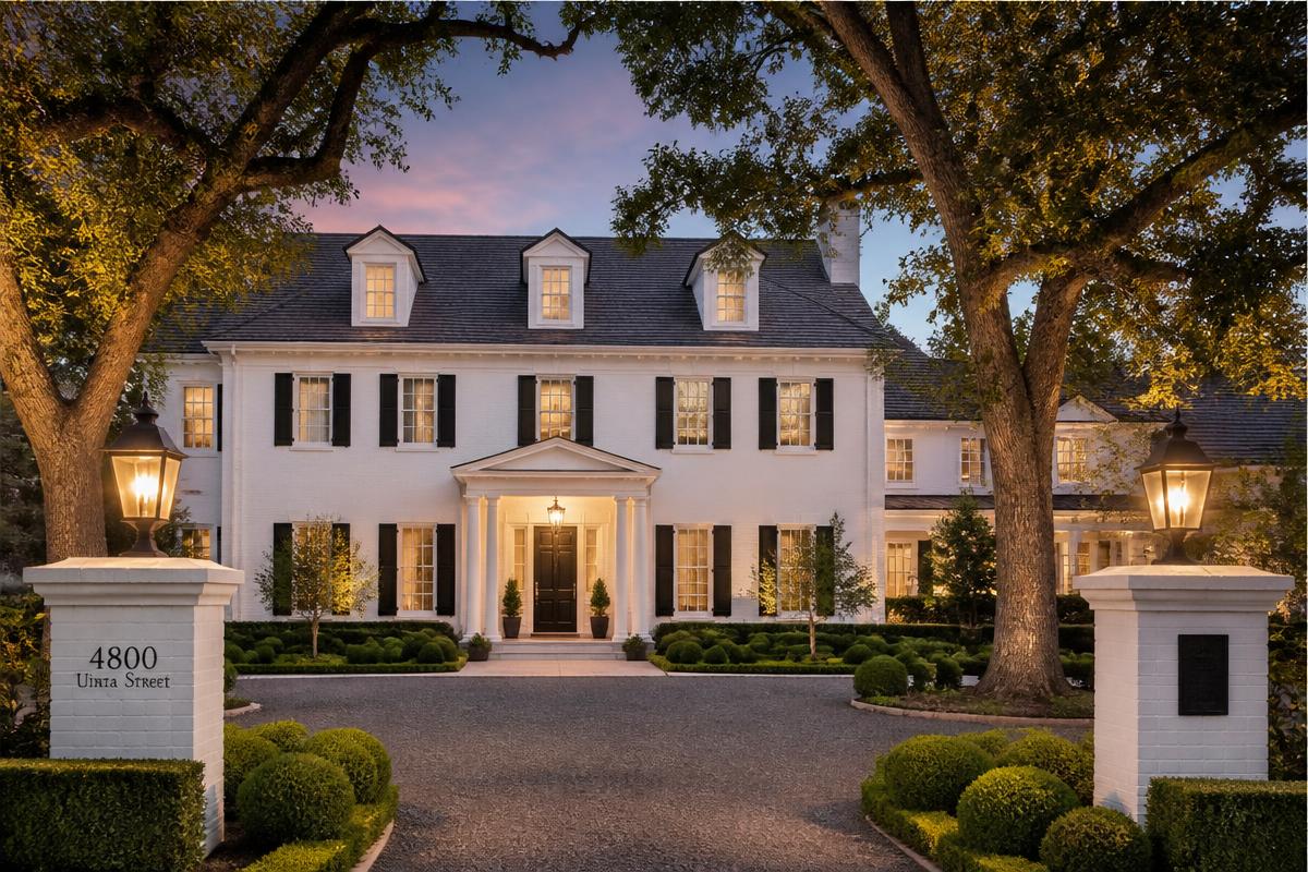 White colonial estate with black shutters in Crestmoor